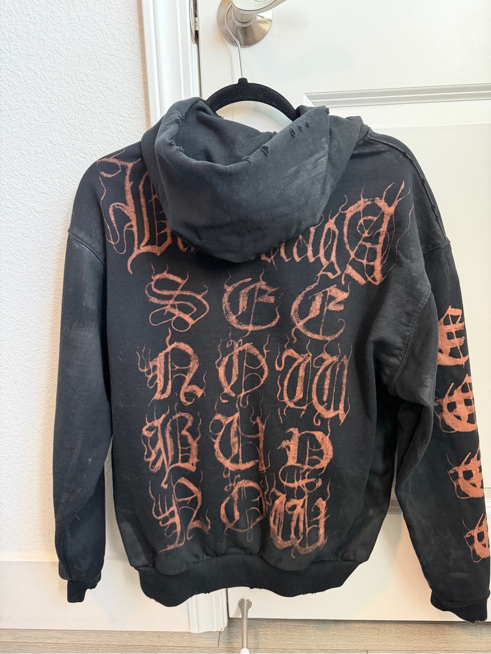 BALENCIAGA Black Graphic Hoodie with Rust Red Gothic Script